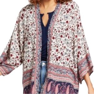 Boho Floral Patchwork Kimono with Tassels stock photo patterns slight different